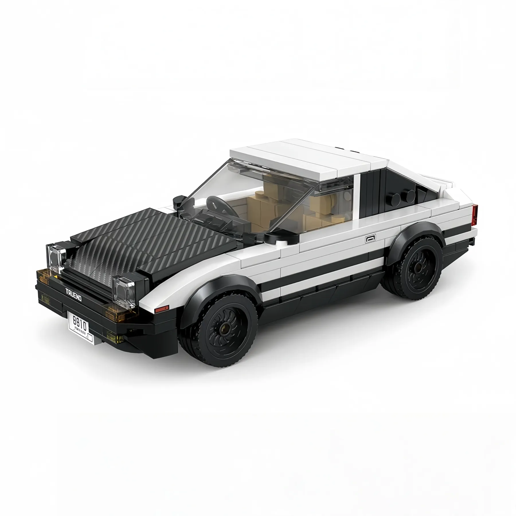White and black Toyota AE86 brick model sports car with popped-up headlights.