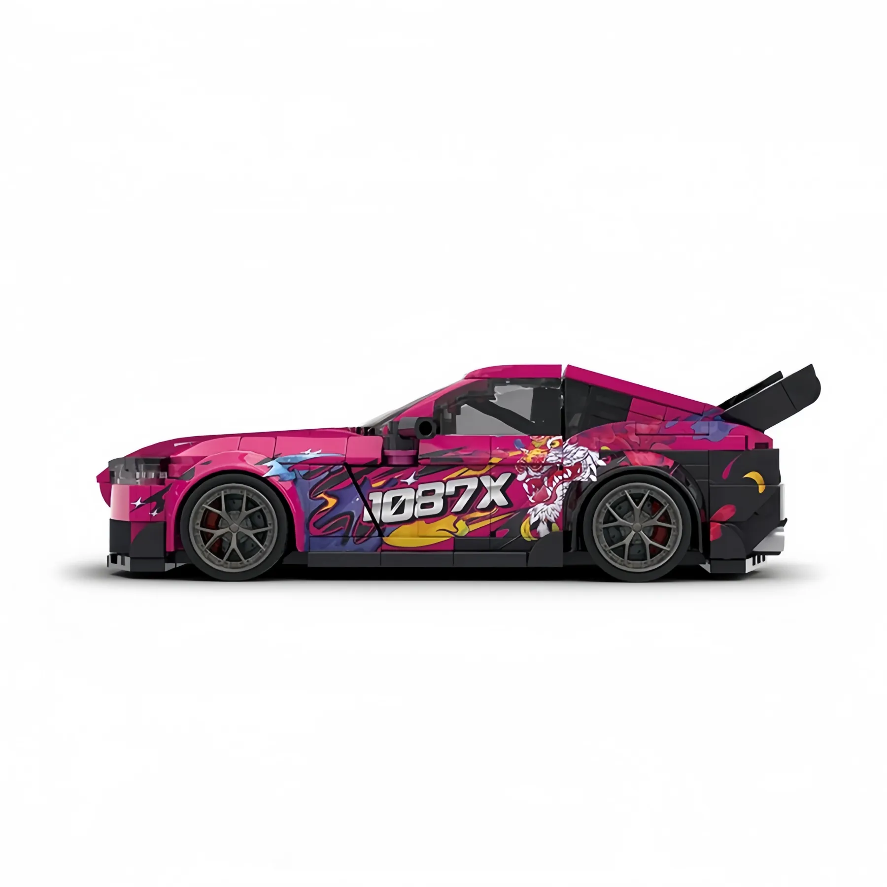 Side profile view of 1:32 Toyota Supra MK5 brick model showing the pink 1087X anime livery and sports wheels.